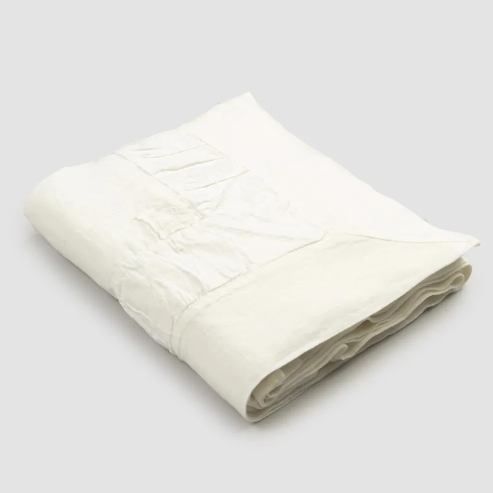 Rechteckige Tischdecke aus weißem Leinen, Rahmen und geprägter Kantenfalte - Mippel