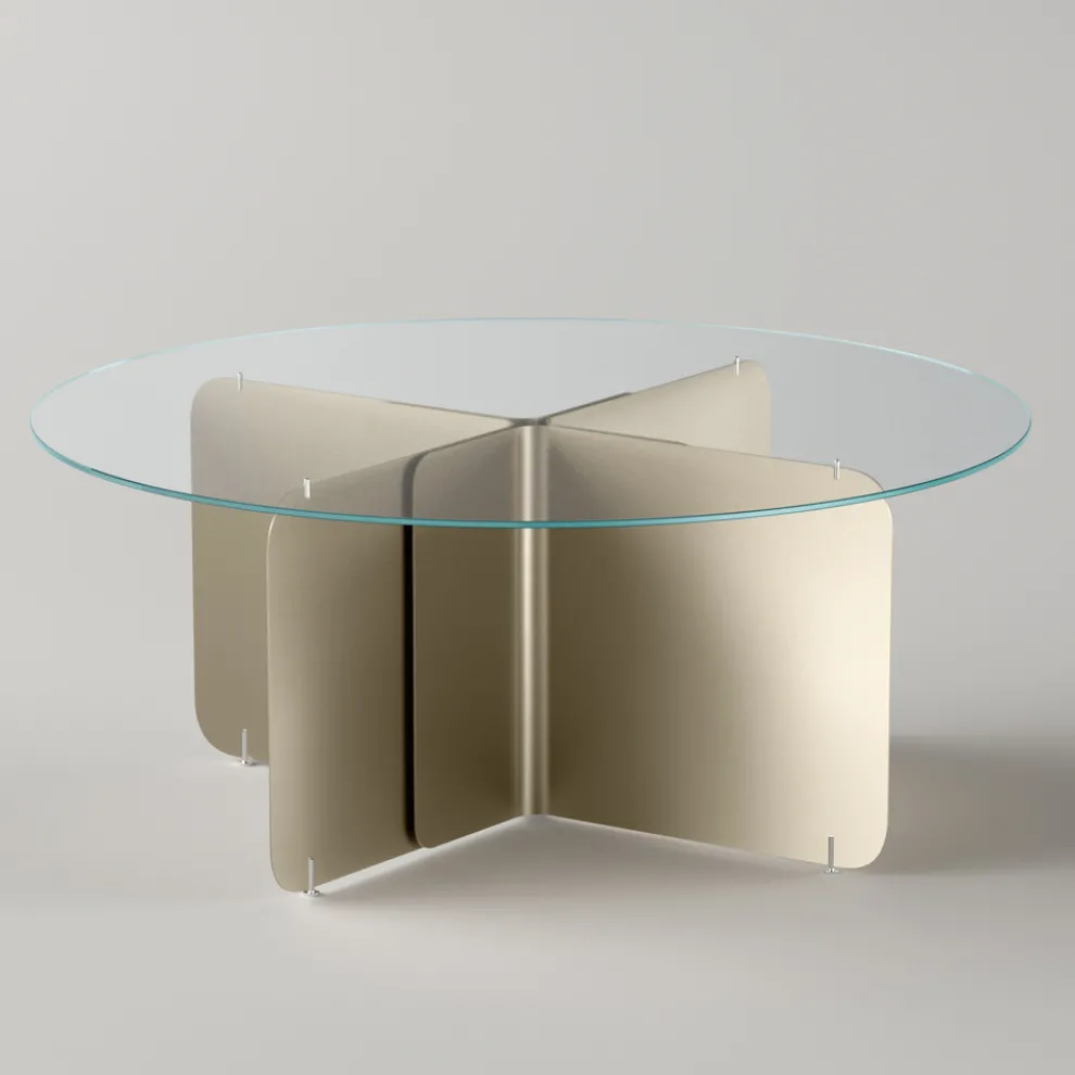 Runder Tisch mit extraklarer Glasplatte und champagnerfarbenem Untergestell - Piacere